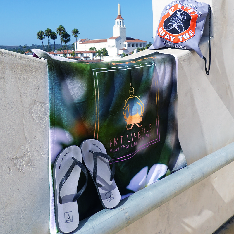 Free Slippers with purchase of a #MUAYTHAILIFESTYLE Beach Towel!